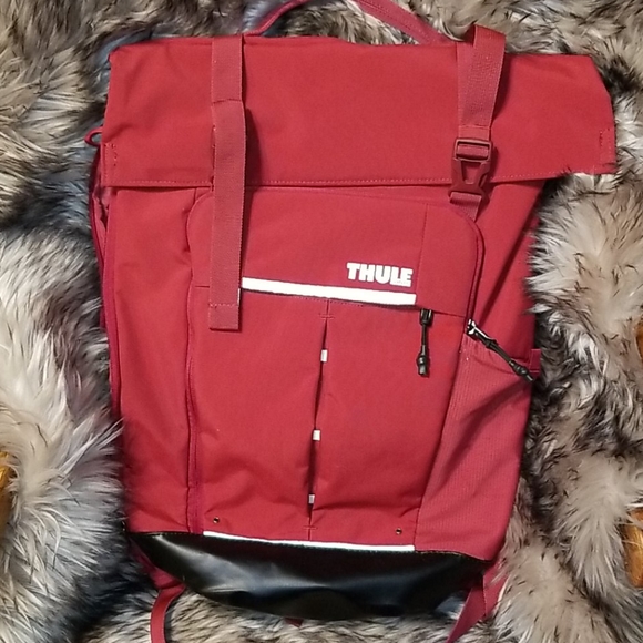 thule red backpack